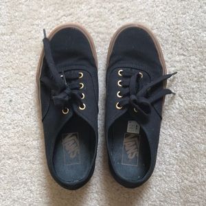 Black and Gold Vans.